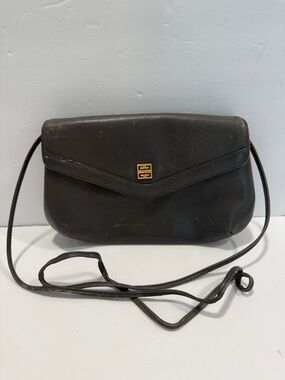 Givenchy vintage Elegant Black Leather Crossbody Bag with Gold Accent